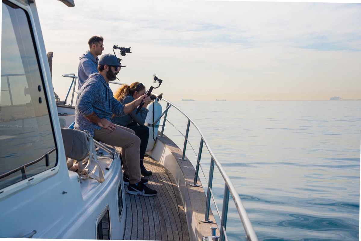 photographic customers make pictures on board in front the barcelone skyline by charterinad.com photographic customers make pictures on board in front the barcelone skyline by charterinad.com